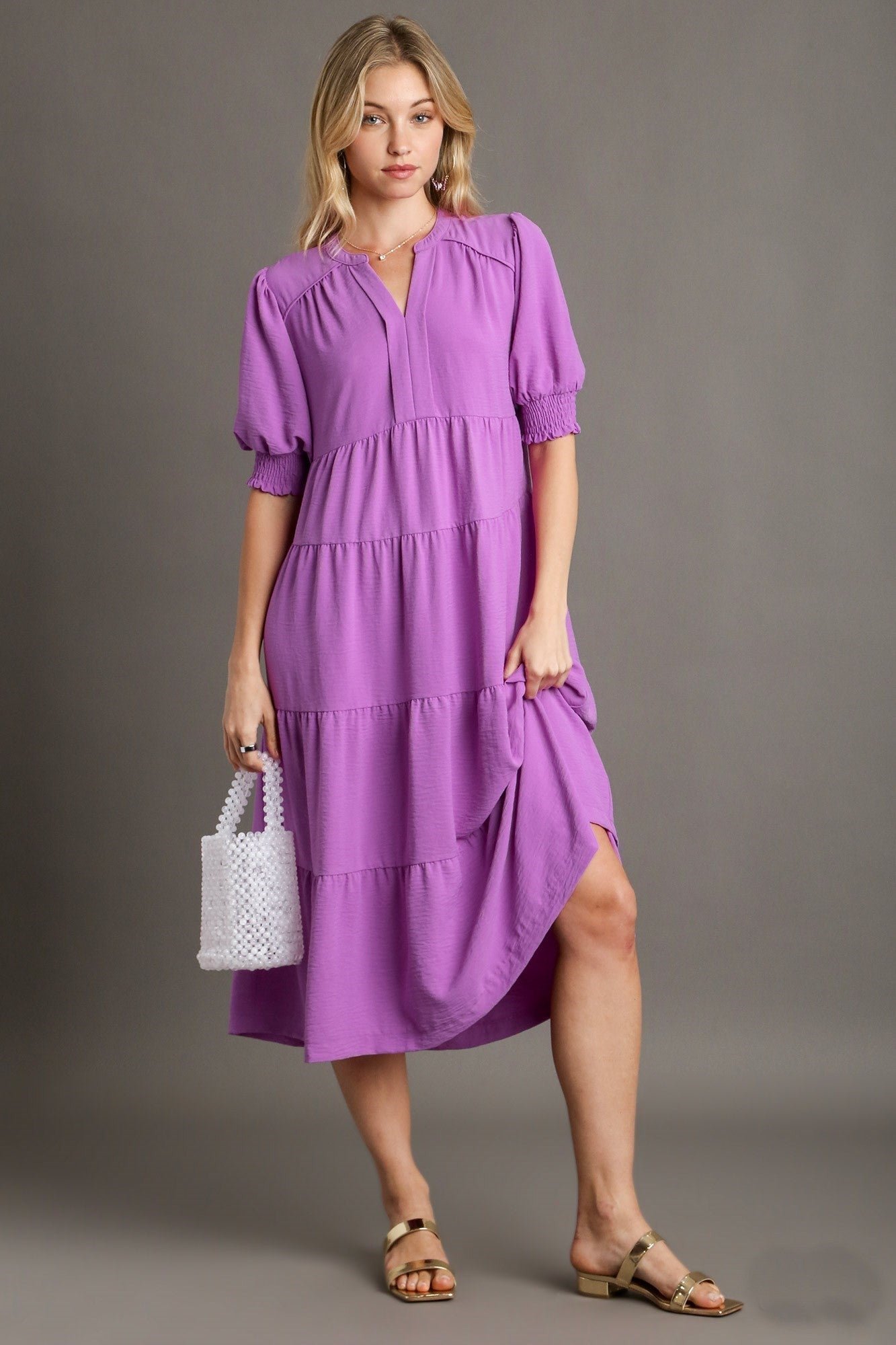 K7786_zx_1.jpg Umgee Solid Color A-Line Tiered Midi Dress with Piping Details in Orchid ON ORDER - Image 1